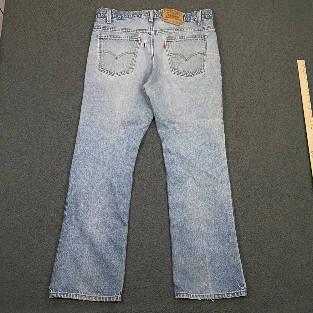 VTG 90s Levis 517 Jeans FITS 36x31 Orang Tab Bootcut Light Wash Blue Distressed